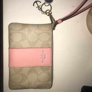 Brand new coach wristlet - never used .